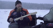 Playing guitar on the sled